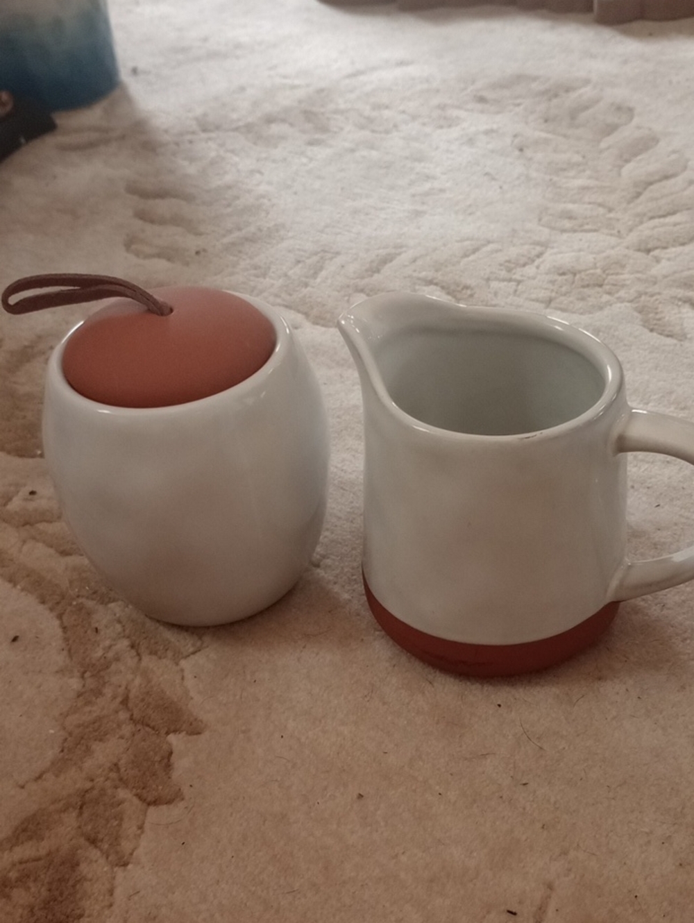 White Ceramic Creamer and Sugar Jar with Terracotta Accents